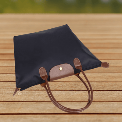 Oxforte – Elegant Axelväska i Oxfordtyg och Läderdetaljer